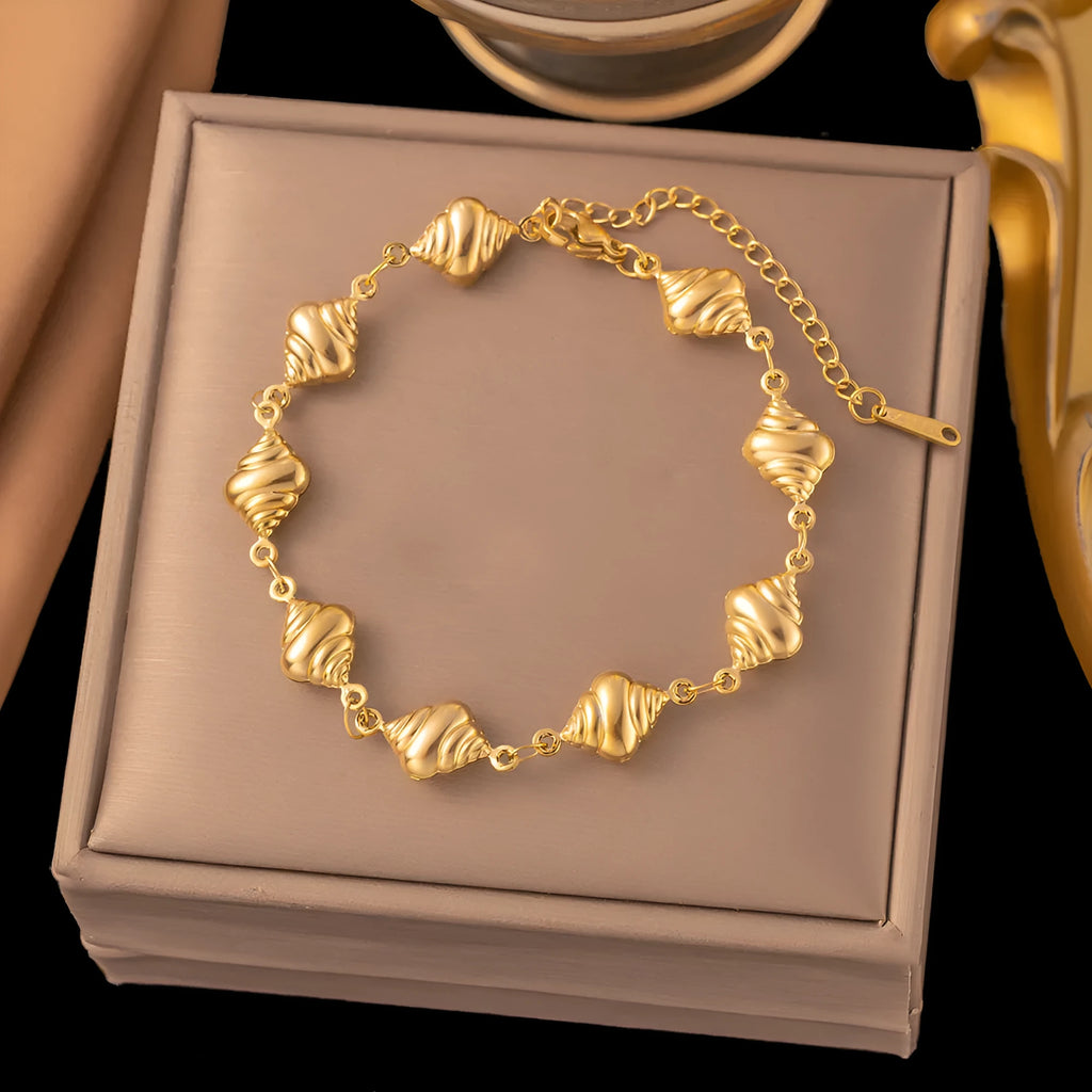 Gold conch necklace and bracelet set for women in titanium steel with pearl element