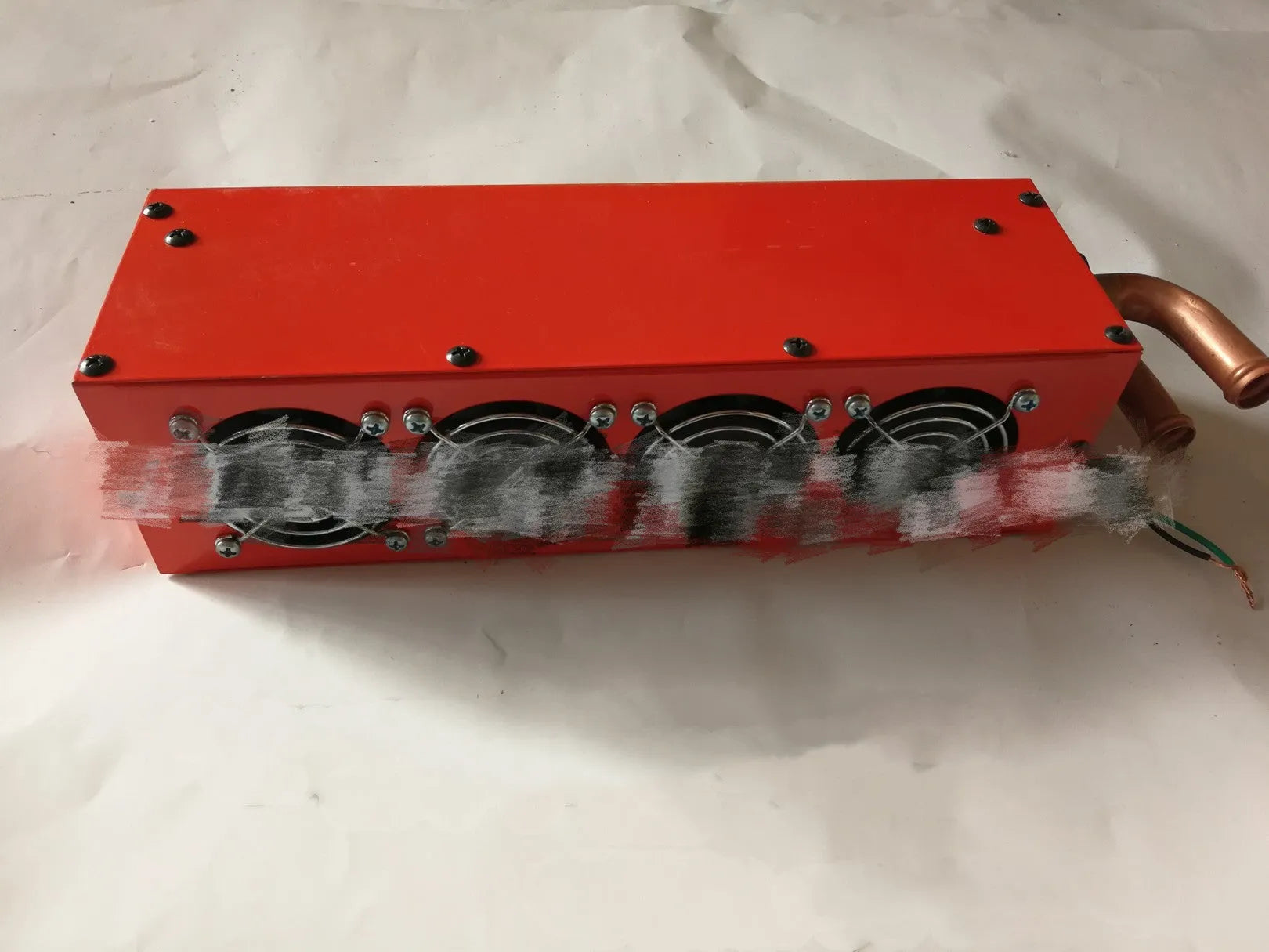 Metal car heater with copper pipe connector for 12V or 24V vehicle installation.