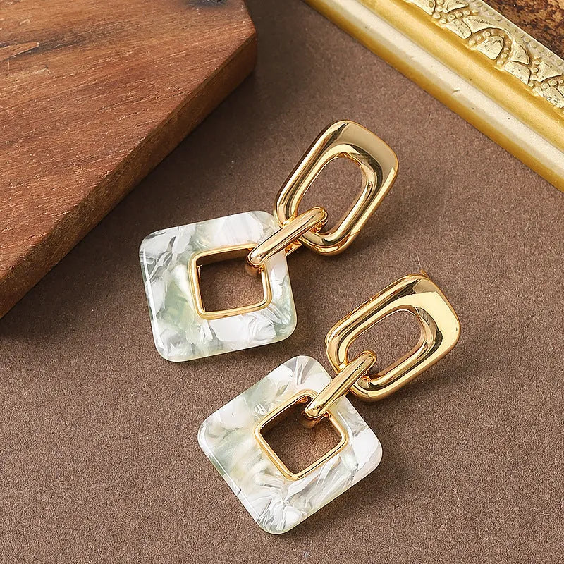 Copper geometric square earrings with hollow design and chamfered corners
