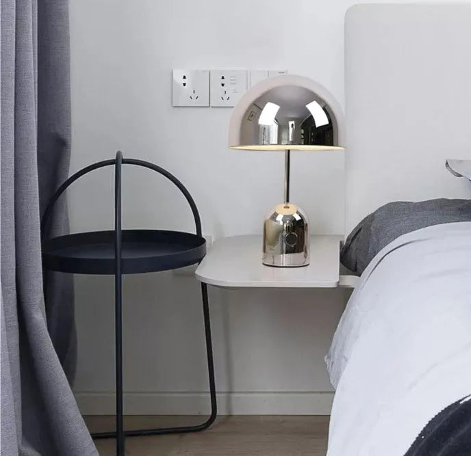 Post-modern metal table lamp with 280mm diameter in rose gold finish on wooden surface