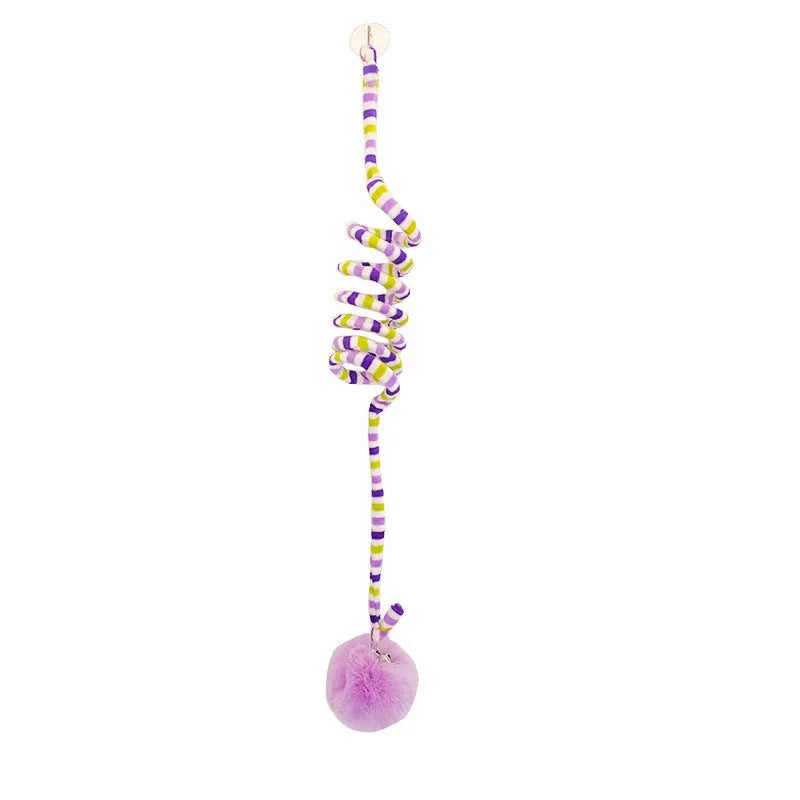 Blue inflatable ball on a spring attached to a plastic handle with suction cup, a cat toy for kittens