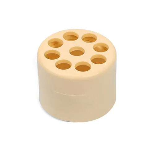 Three spiral stem brackets in green, light gray, and yellow placed on a table