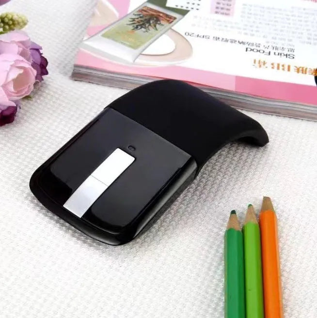 Folding Bluetooth wireless mouse showing compact design in black colour
