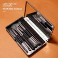Portable makeup brush set with mirror showing silver or gold brushes with 2.6cm artificial fibre bristles