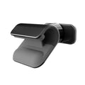 Black universal gravity car phone holder mounted on a dashboard, showing 360-degree rotation.