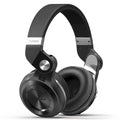 Black Bluetooth headset with an in-line card plug-in, shown as a head-mounted bilateral stereo unit.