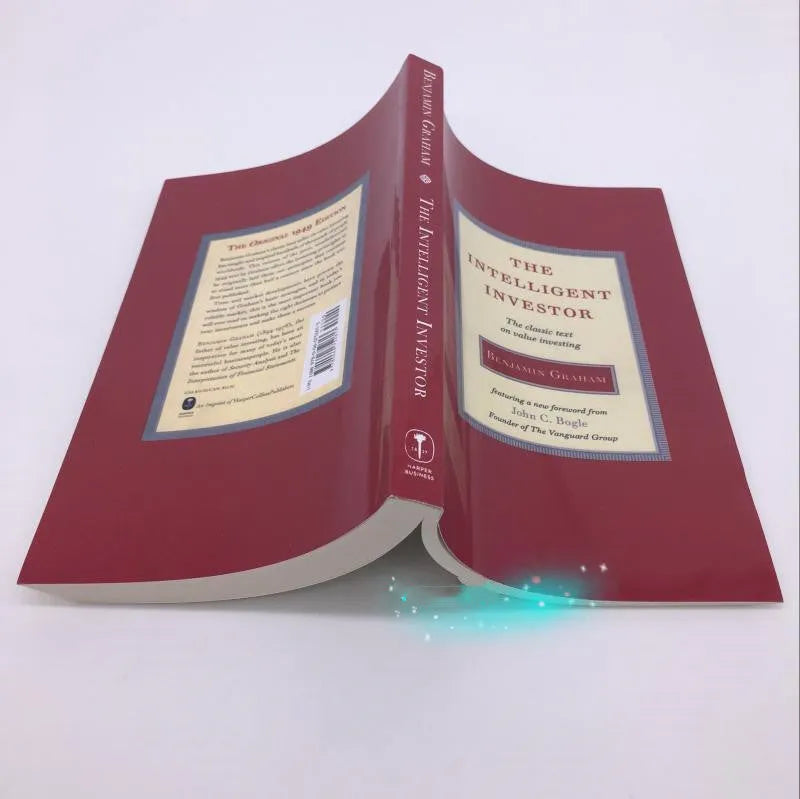 Paperback copy of The Intelligent Investor book by Benjamin Graham, front cover showing title and author.