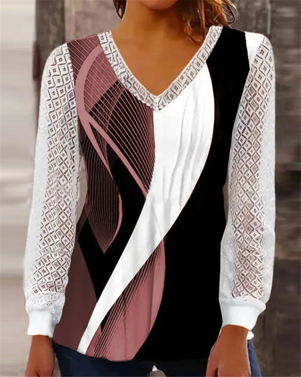 Loose fit V-neck lace top with hollow-out details in polyester fabric