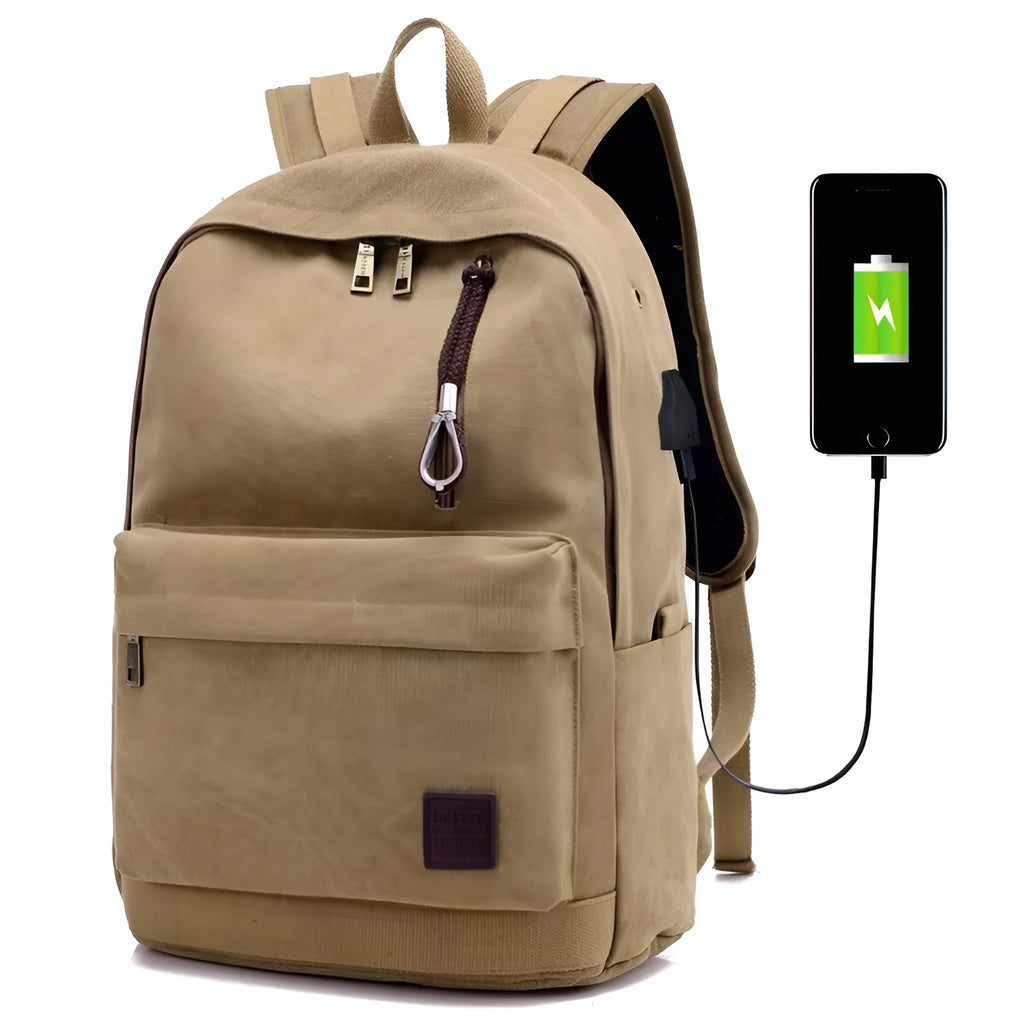 Canvas USB charging backpack in grey colour showing front pockets and side USB port.