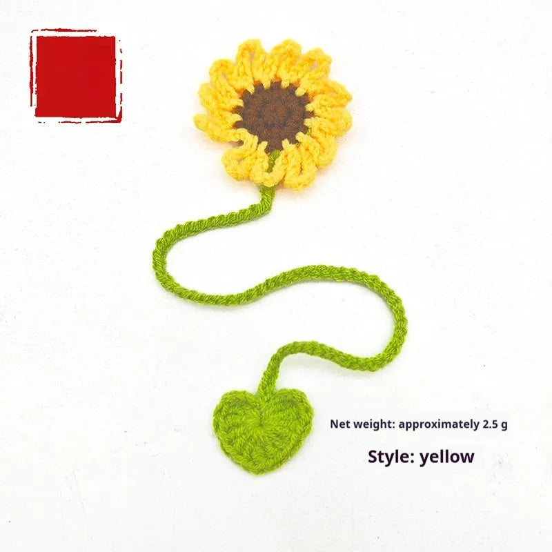 Hand-crocheted flexible wire bookmark with a small daisy design in assorted colours