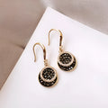 Black geometric alloy earrings with retro Hong Kong style measuring 3.6 cm in length