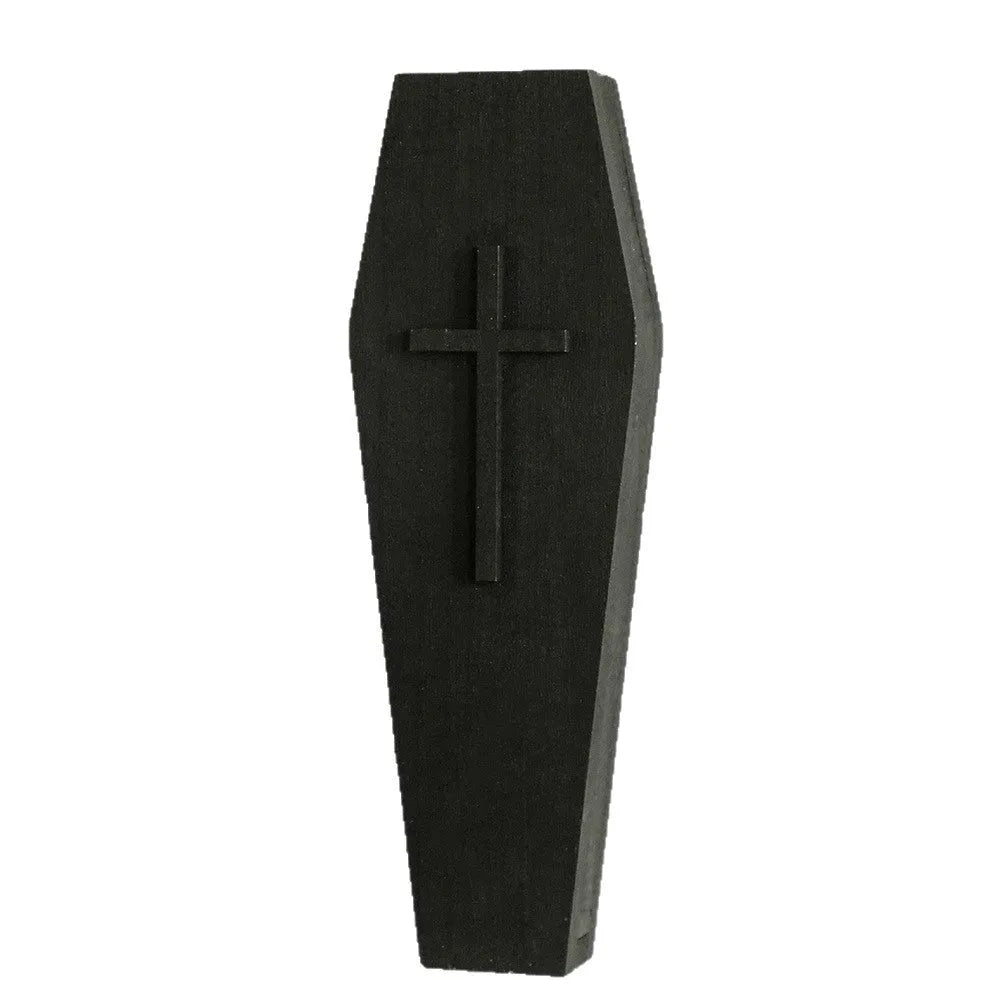 Black wooden cross-shaped wall shelf with space for holding small plants or decorative items.