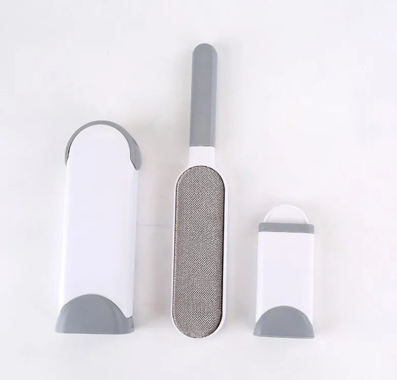 Reusable pet hair removal comb with a self-cleaning base, shown in blue, for cleaning cat and dog fur from sofas.
