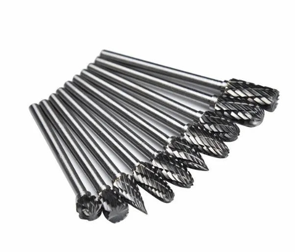 Ten tungsten steel carbide rotary burrs with 6mm head and 3mm shank arranged on a white background