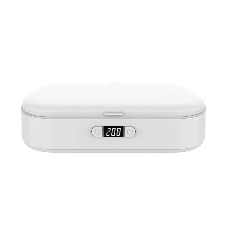 White portable UV sterilisation box with wireless charging for phones and jewellery disinfection