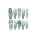 Women's plastic armour costume with diamond camellia gradient chains and bow patterns in blush nails style