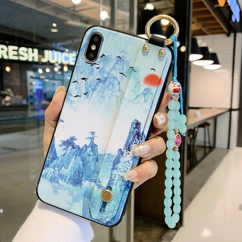 Rose floral design iPhone case with a built-in lanyard loop for a wrist strap