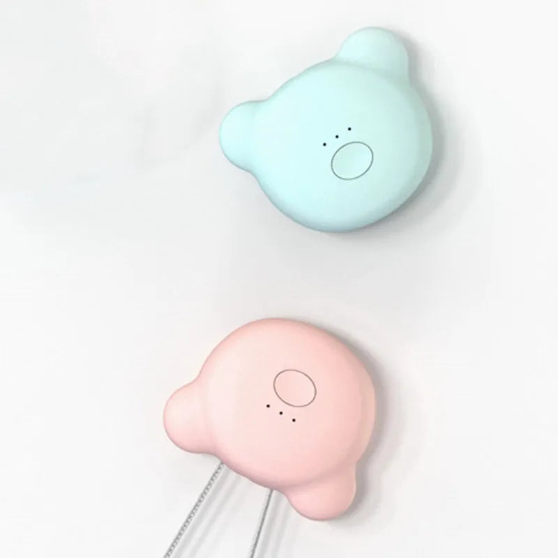 USB rechargeable mini air purifier necklace in blue, showing compact design worn around neck.