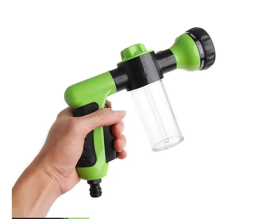 Green high-pressure foam spray gun with adjustable nozzle for car washing and household cleaning tasks