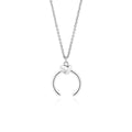 Gold and silver geometric copper pendant necklace on an adjustable cross chain.