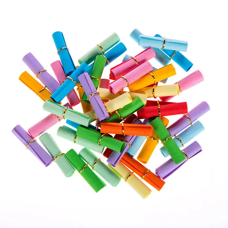 Assorted coloured mini paper scrolls with eyelets in 3x7cm and 7x7cm sizes for drift bottles