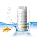 Six-in-one aquarium water quality test paper on a white surface, showing colour pads for total hardness, nitrate, nitrite, chlorine, carbonates, and pH testing