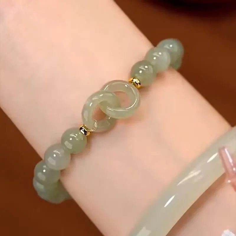 Chinese style glass bamboo leaf bracelet for women with manual craft details.