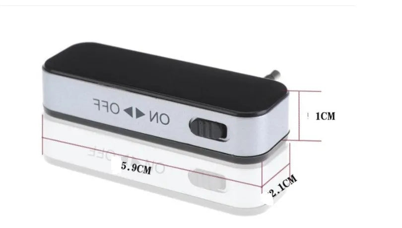 Black car FM transmitter with LCD display showing FM frequency, 3.5mm aux plug connected to smartphone