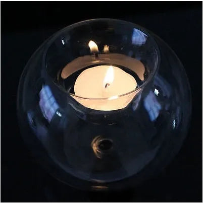 Clear round hollow glass candle holder handmade using hot glass frying table technique