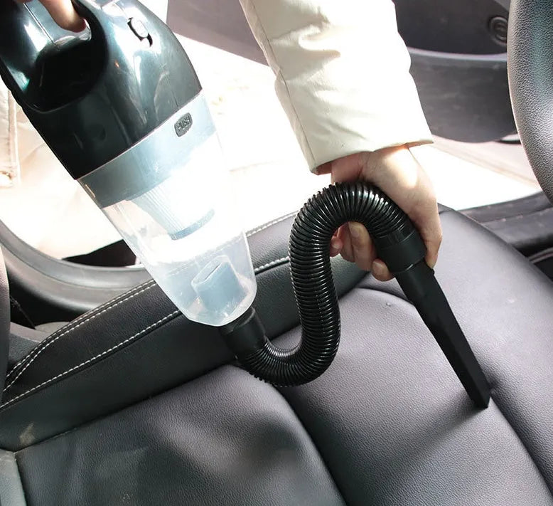 Portable handheld car vacuum cleaner in orange, black or blue with 12V plug and attachments