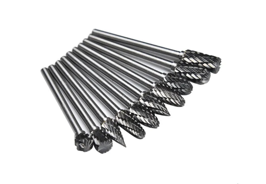 Ten tungsten steel carbide rotary burrs with 6mm head and 3mm shank arranged on a white background