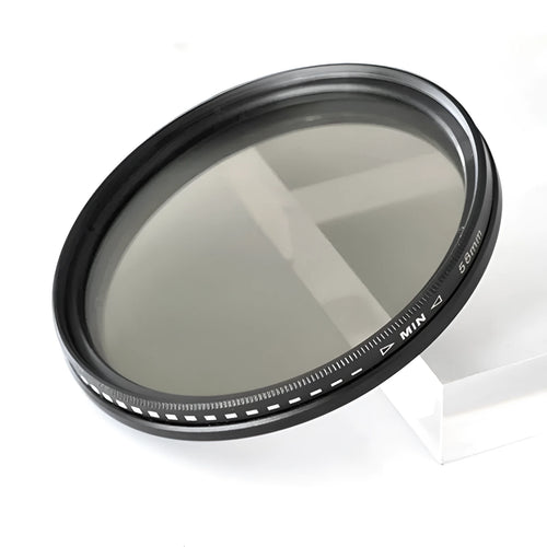 Set of circular camera lens filters in multiple sizes including ND-2, ND-4, ND-8, and ND-400 neutral density filters.