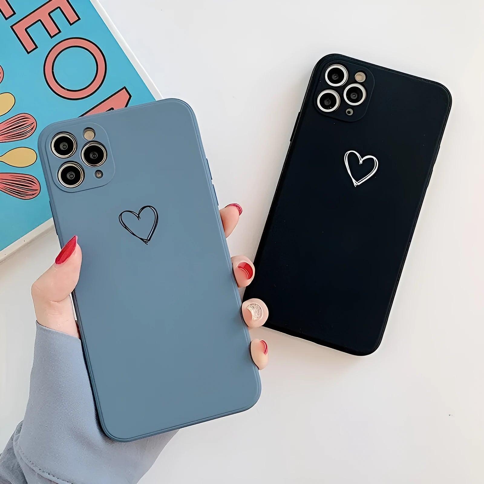 Silicone TPU back cover case for Apple iPhone in a solid colour, showing precise cutouts for camera and ports.