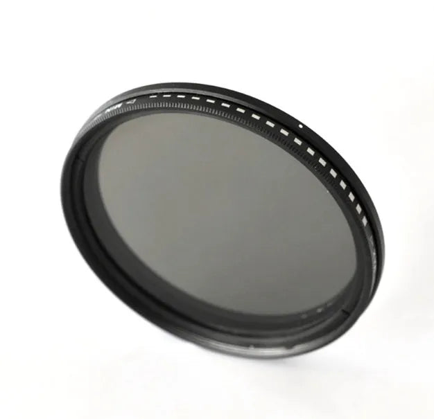 Set of circular camera lens filters in multiple sizes including ND-2, ND-4, ND-8, and ND-400 neutral density filters.