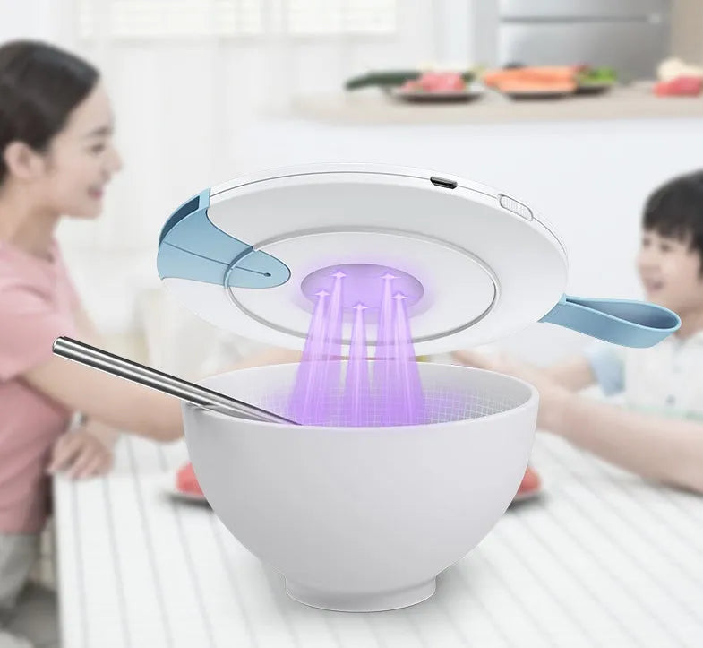 A slim, portable UV-C baby bottle steriliser in blue, showing its compact size and USB port.