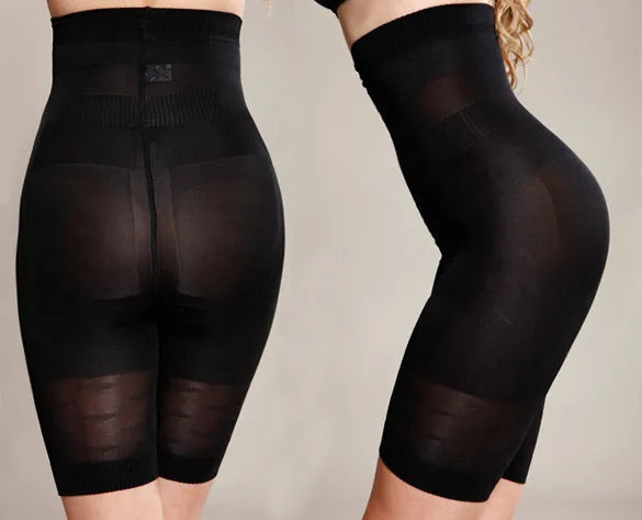 Women's black seamless high-waist shapewear shorts for tummy control laid flat.