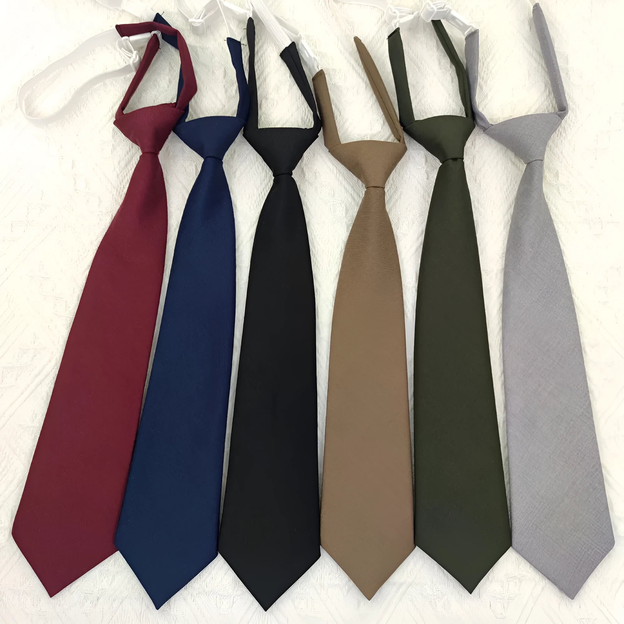 Navy blue cotton men's tie with arrow tip style measuring 35cm by 7cm
