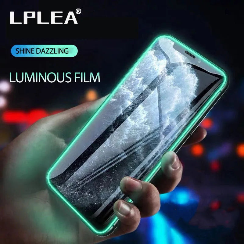 Luminous full cover tempered glass screen protector for iPhone glowing softly in dark conditions.