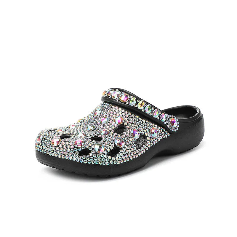 Black women's platform sandals with rhinestone detailing and a hole shoe design on an EVA sole.