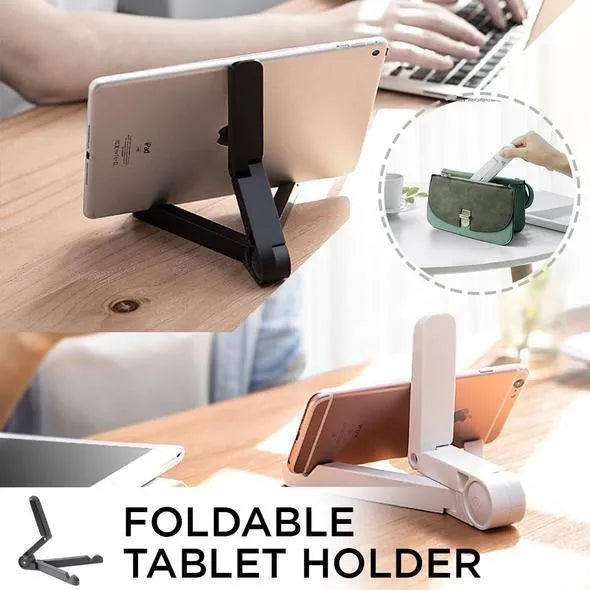 Black foldable tablet holder open on a table, holding a smartphone in landscape mode.