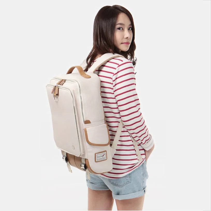 Large men's backpack in Oxford cloth, shown in grey, with dimensions 30cm by 16cm by 46cm.