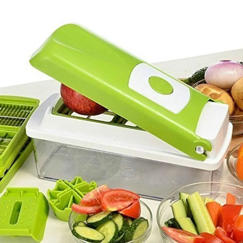Green 12-piece manual vegetable chopper and food dicer set with stainless steel blades on a kitchen counter.