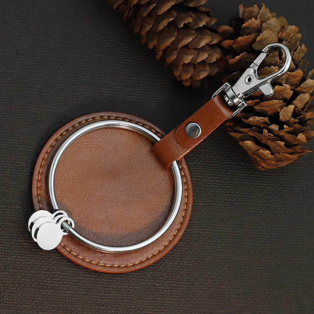 Round genuine leather keychain pendant with cross crown Roman numerals design steel-coloured gloss finish stainless steel key ring