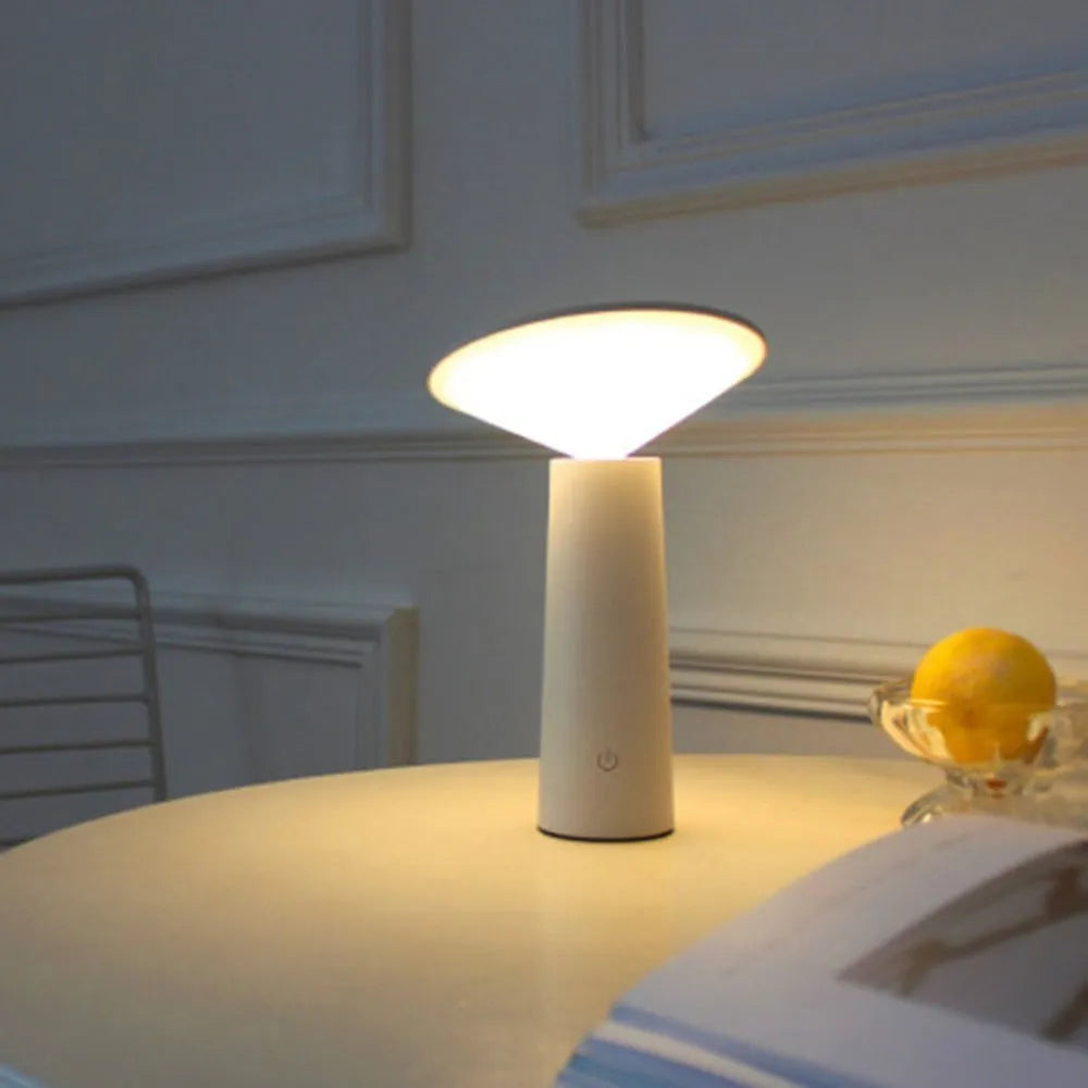 Black USB LED table lamp with touch sensor controls and adjustable lamp head for reading