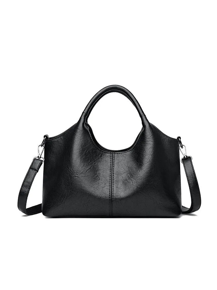 Women's soft genuine leather cross-body bag in seven colour options with large capacity