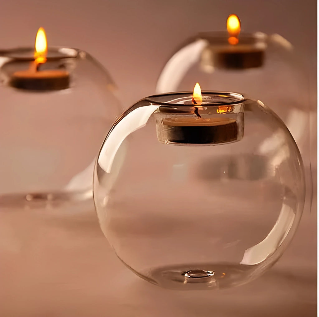 Clear round hollow glass candle holder handmade using hot glass frying table technique