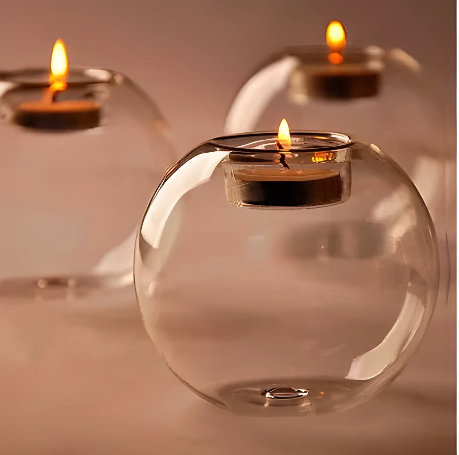 Clear round hollow glass candle holder handmade using hot glass frying table technique