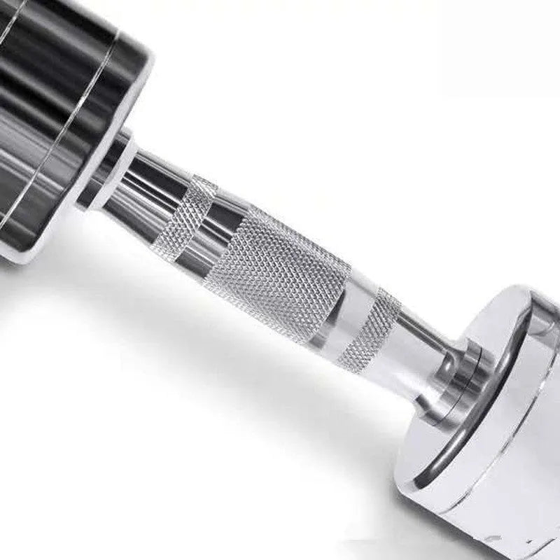 Silver pure steel 1kg dumbbell with ergonomic handle on a grey background.