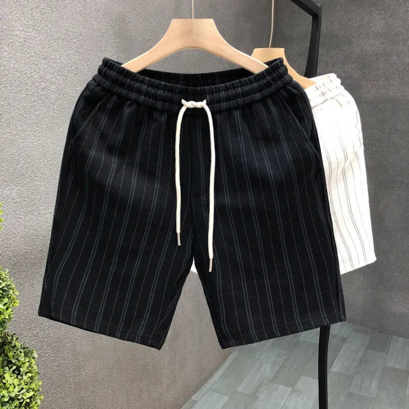 Men's black and white striped casual shorts with fleece lining and elastic waistband