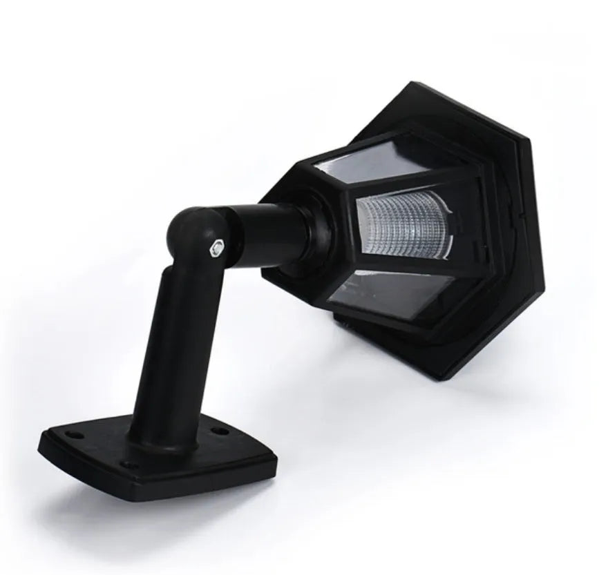 Black hexagonal solar wall lamp for outdoor garden lighting with automatic light sensor